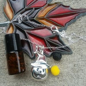 Pumpkin in witches hat oil diffuser necklace